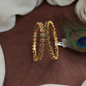 "Antique Floral Design Bangles with Kemp & Green Stones"