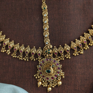 Antique Gold Peacock Tikka Set – A Timeless Bridal Treasure