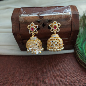 Alluring Gold Plated Jhumka With Zircon Stones With Pearl Dangling