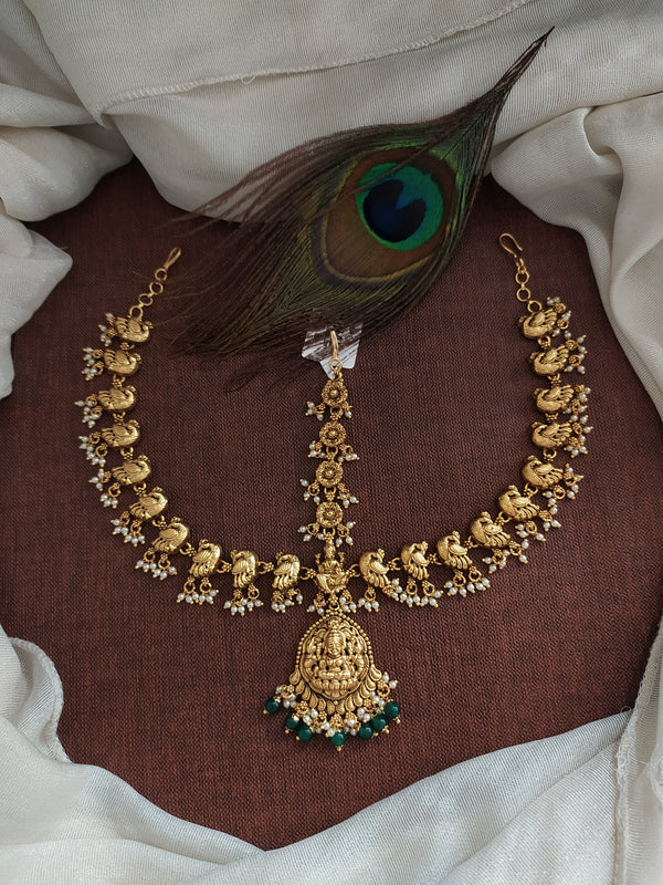 Divine And Traditional Lakshmi Peacock Tikka Set with Dangling