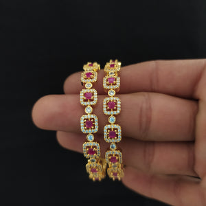 Glamorous Gold Plated Ruby & Green Zircon Bangles