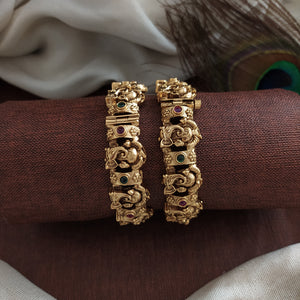 Enchanting Embrace Of Rich Look Antique Kemp Stones Screw Bangle