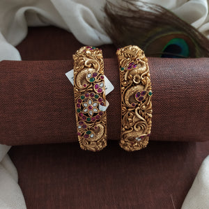 Enchanting Elegance: The Peacock Design Matt Finish Antique Screw Bangle