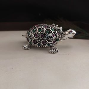 Elegant Tortoise-Shaped Kumkum Box in German Silver with Kemp and Green Stones
