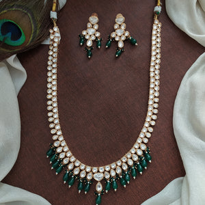 U-Shaped Kundan White Long Haram Set with Green Pear-Shaped Beads