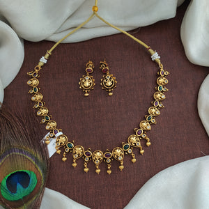"Antique Floral Design Necklace Set with Kemp & Green Stones and Golden Ball Drops"