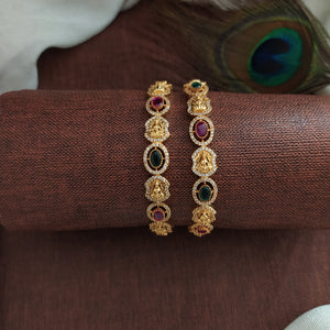 "Oval-Shaped Antique Lakshmi Bangles with Kemp, Green, and White Zircon Stones"