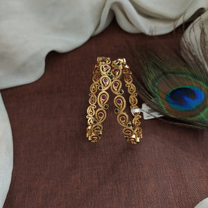 "Antique Mango-Shaped Bangles with Kemp and Green Stones"