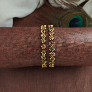 "Antique Floral Design Bangles with Kemp & Green Stones"