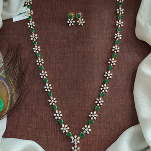 Nakshatra Design Zircon Long Haram Set | Diamond Finish | Green, Ruby & Violet