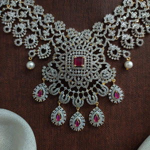 Zircon Long Haram Set with Ruby & White CZ Stones | Gold Diamond Finish | Comes with Jhumki