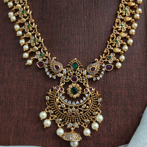 Antique Non-Idol Long Haram Set with Floral & Peacock Design and Pearl Drops