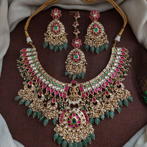 Traditional Jadau Kundan Bridal Set with Lakshmi Motif, Guttapusalu Pearls & Maang Tikka