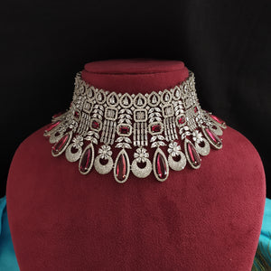 Splendid Bridal Choker set with earrings and Tikka in Ruby Color Stones