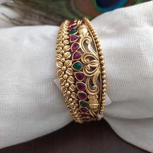 Antique Kada with floral Design with Kemp Stones having ruby and green color 